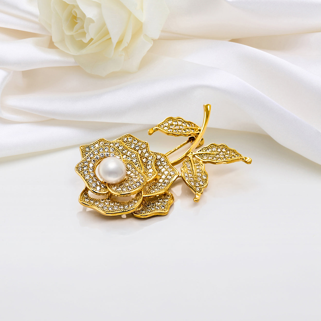 Regal Pearl Brooches