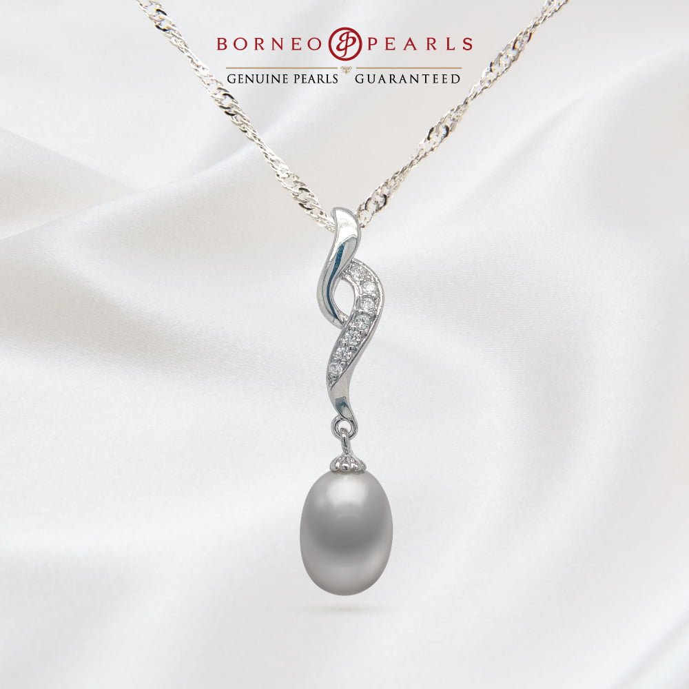 The Woman of Borneo - Story Pearl Pendant