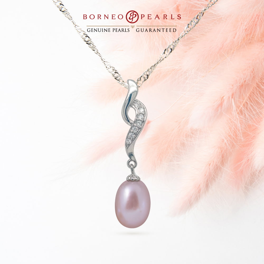 The Woman of Borneo - Story Pearl Pendant