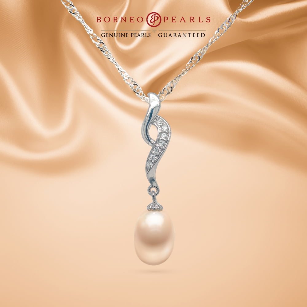 The Woman of Borneo - Story Pearl Pendant