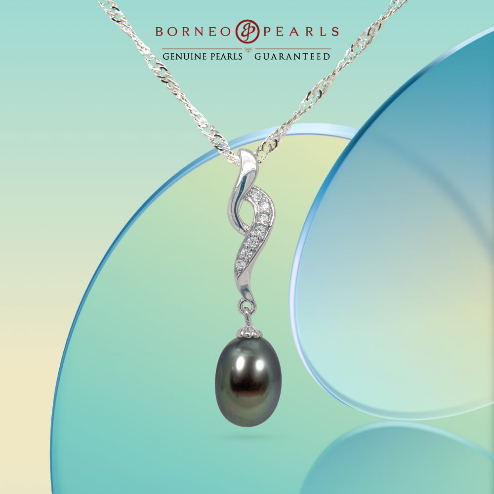 The Woman of Borneo - Story Pearl Pendant